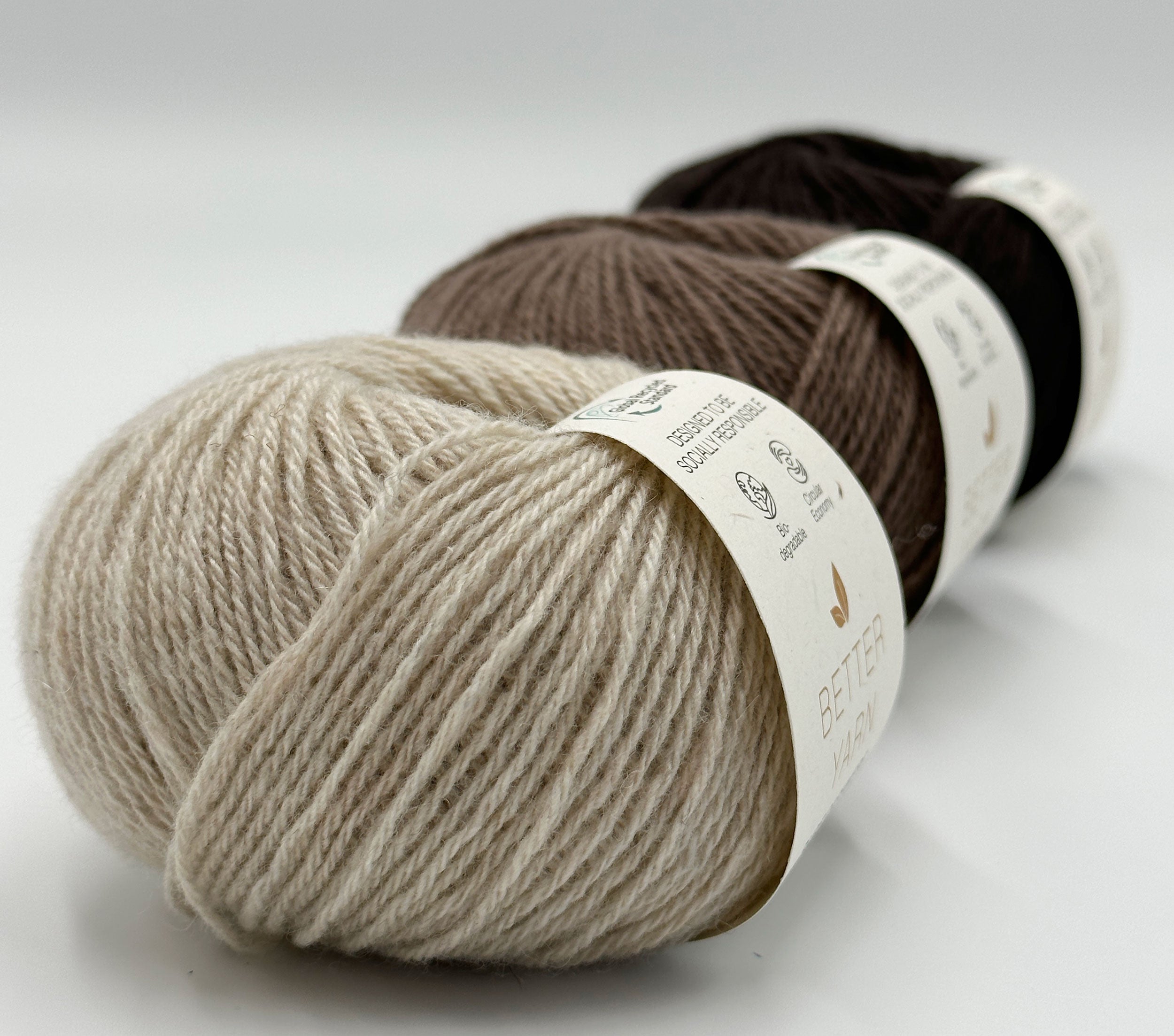 3 nøgler RECYCLED CASHMERE der ligger på stribe